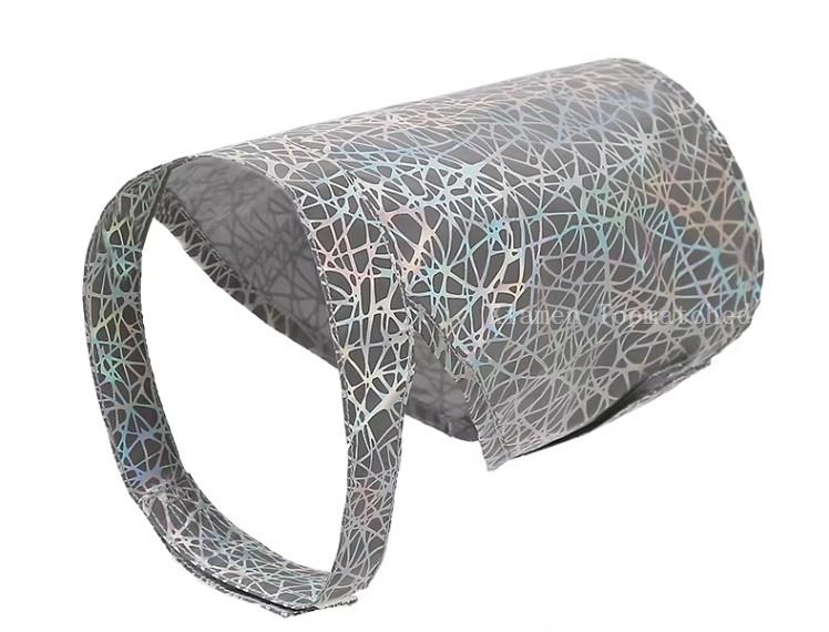 Geometric reflective dog vest fabric showing colorful luminous visibility for night walking Geometric reflective dog vest fabric showing colorful luminous visibility for night walking